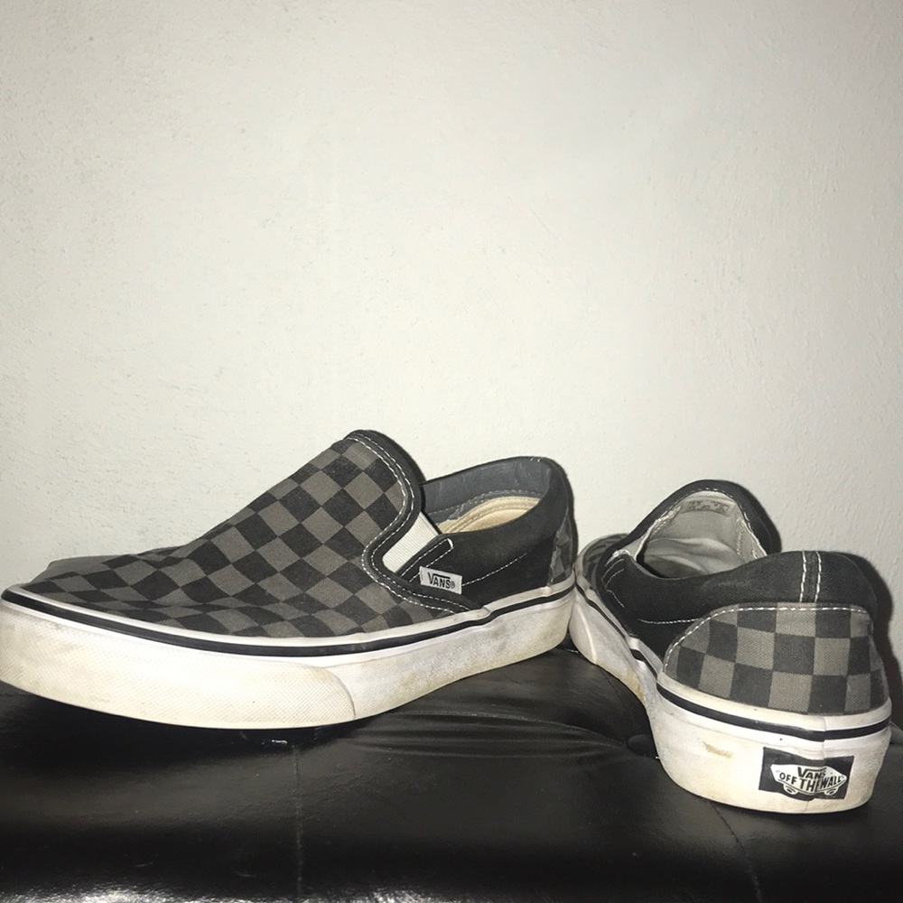 Gray and black checkered Vans